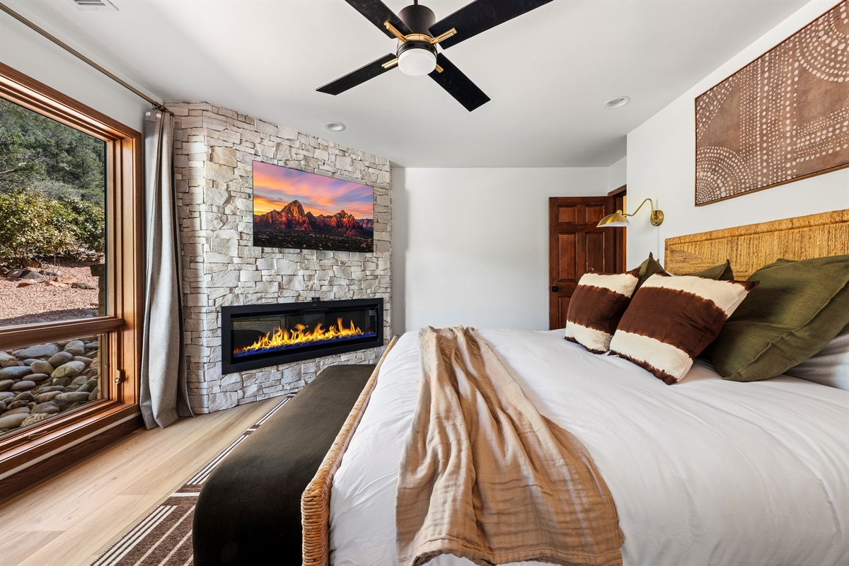 King Bedroom 2
Comfort meets design—spacious king suite with a beautiful stone fireplace.