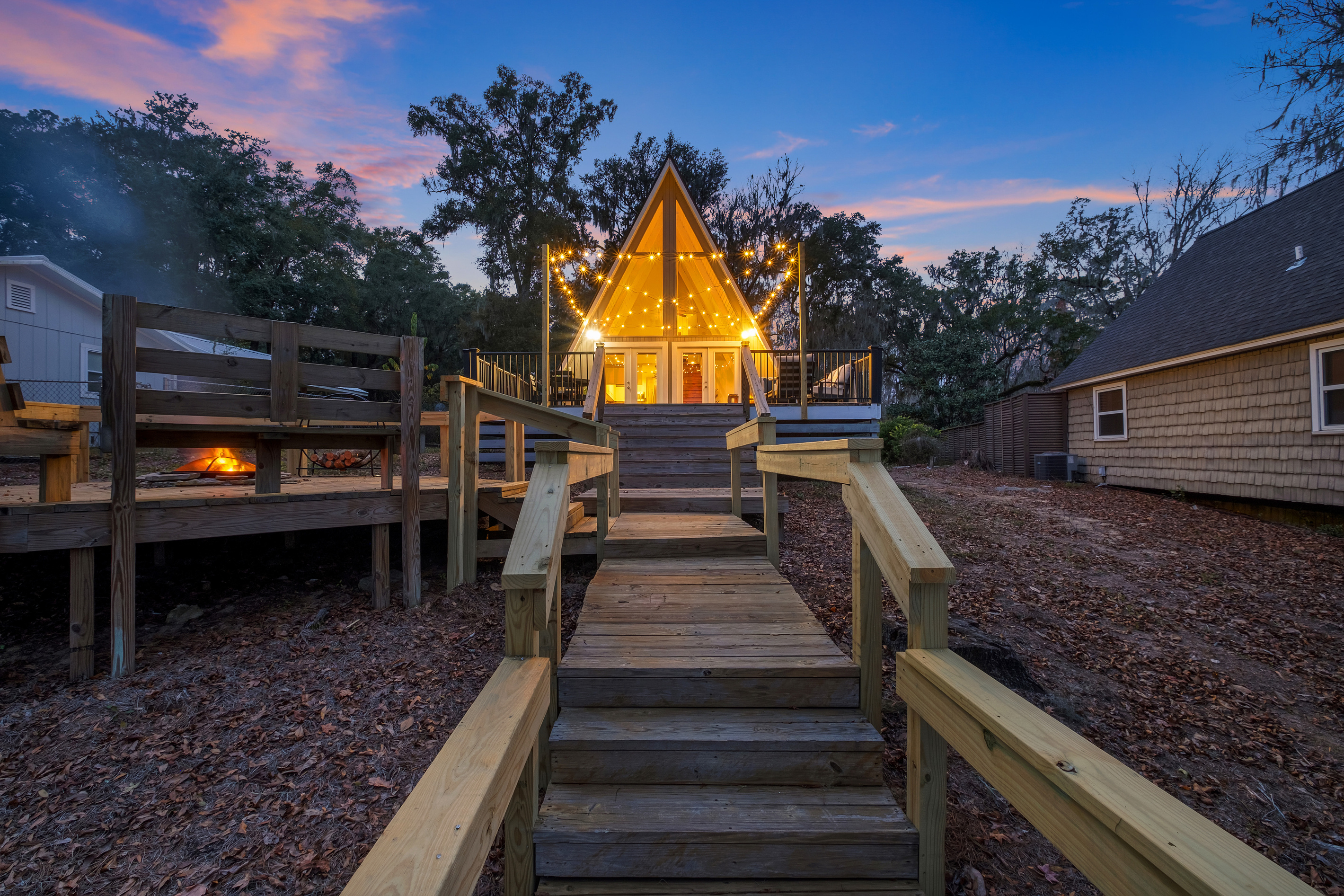 The A-frame lit up at dusk