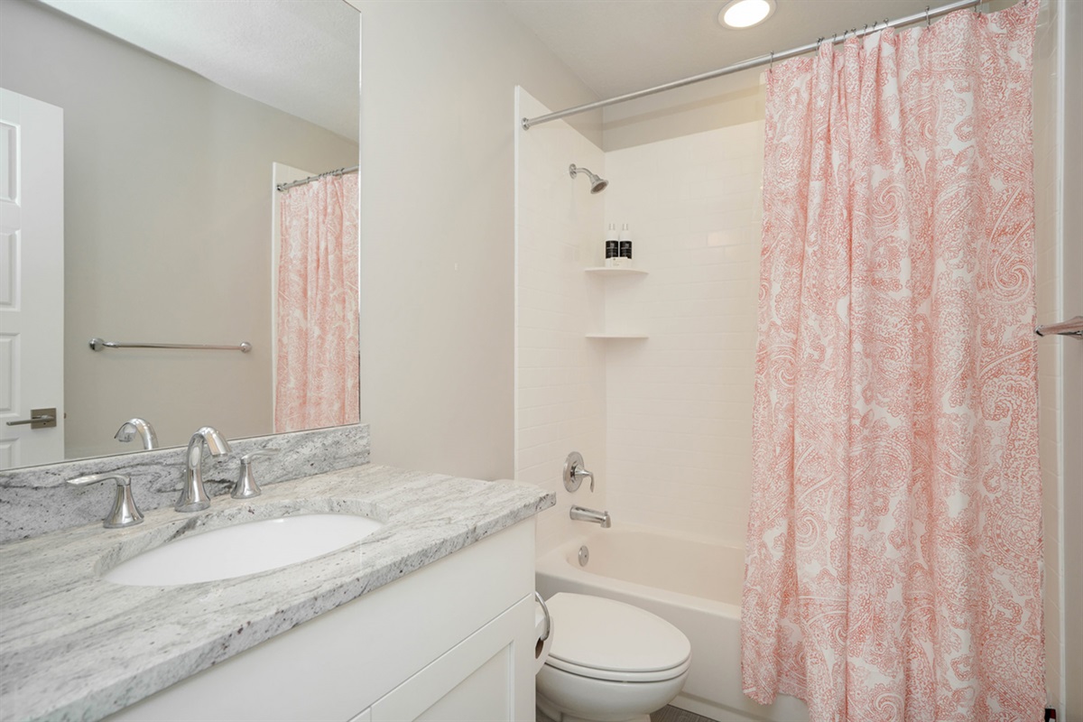 Ensuite bathroom with tub/shower combo. We provide the bathroom essentials.