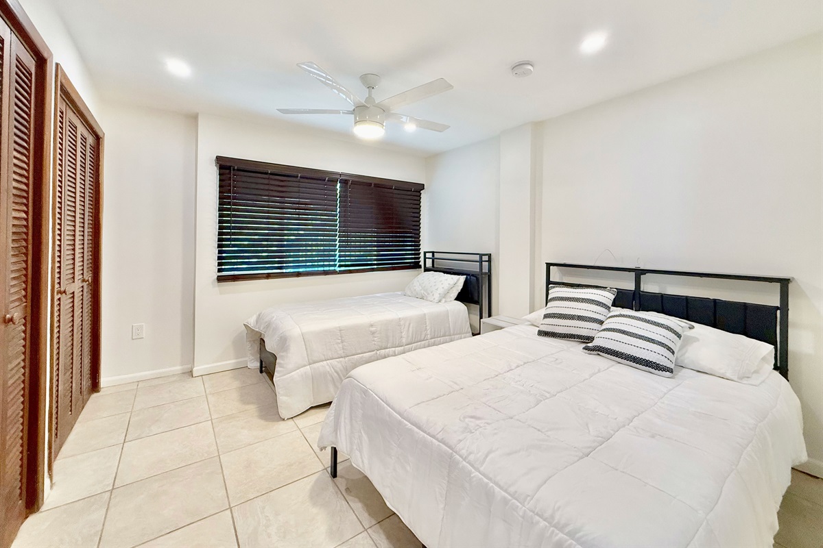 The guest room has a queen and twin bed which is perfect for families