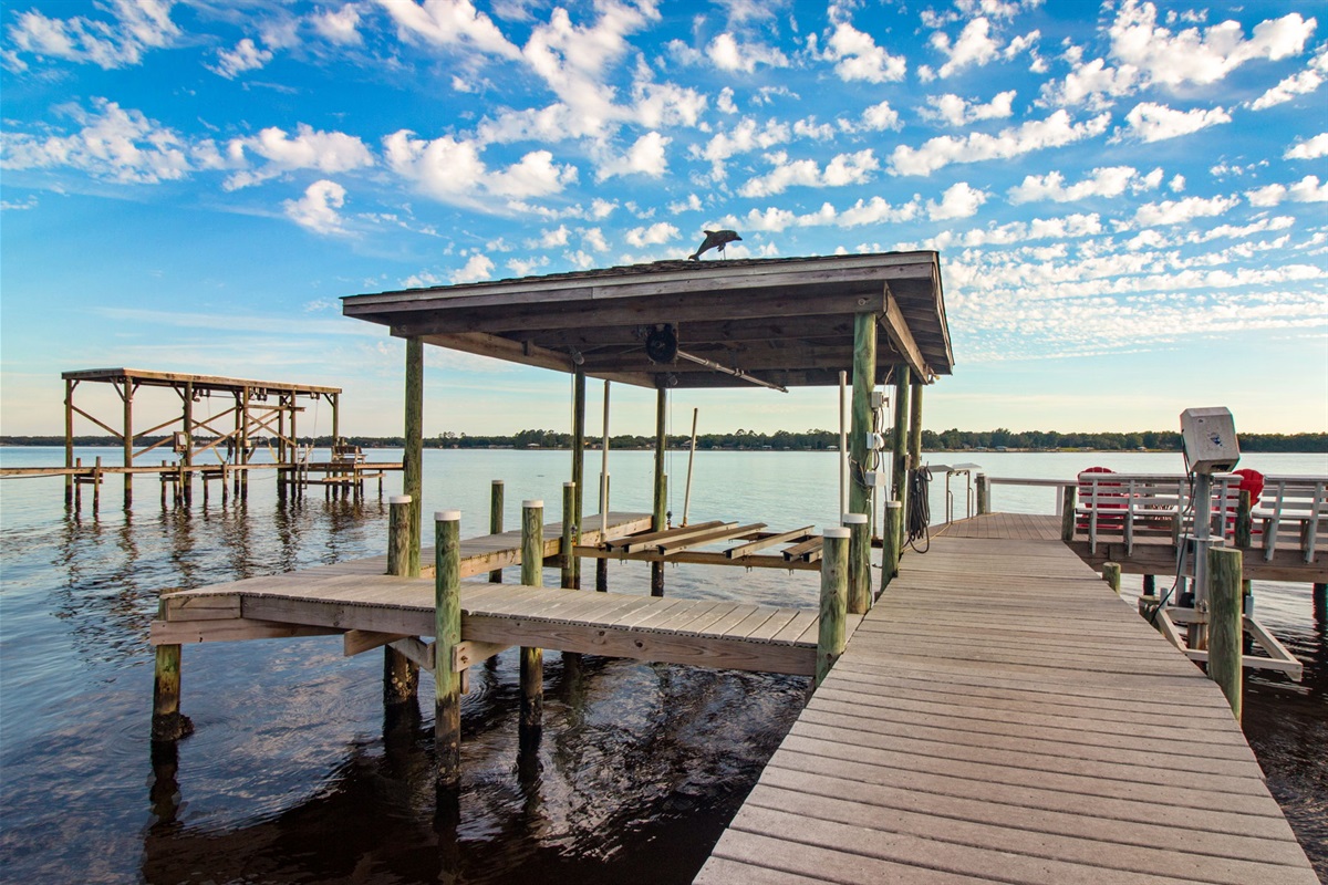 Boat dock with lift. Cleaning station. 