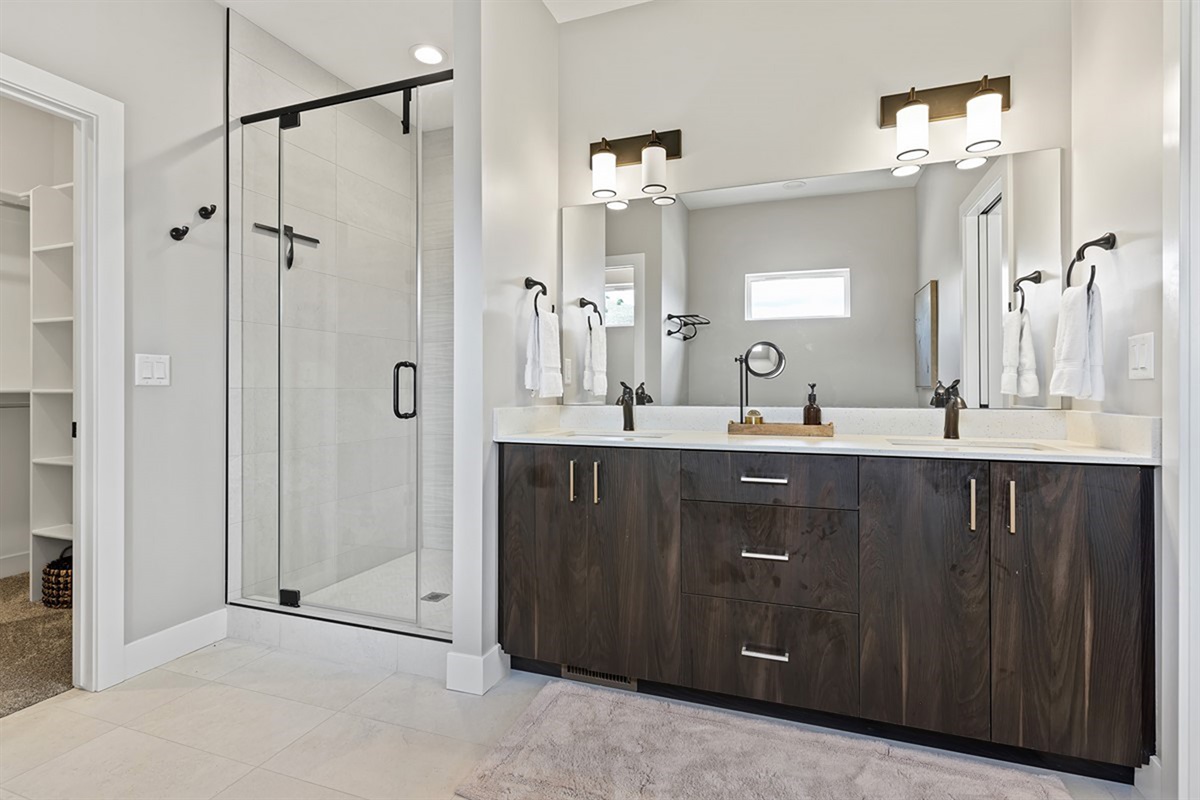 Luxurious bathroom with walk-in shower and double vanity
