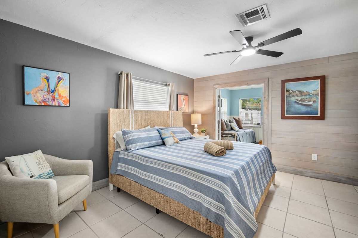 Main Bedroom with access to the Florida room that leads to the back yard
