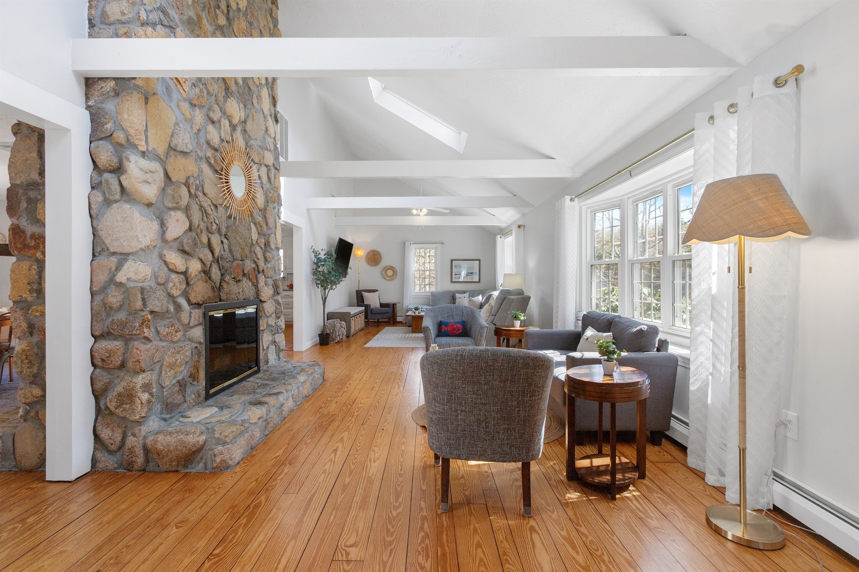The fireplace sets the perfect mood for movie nights, game nights, or simply unwinding.