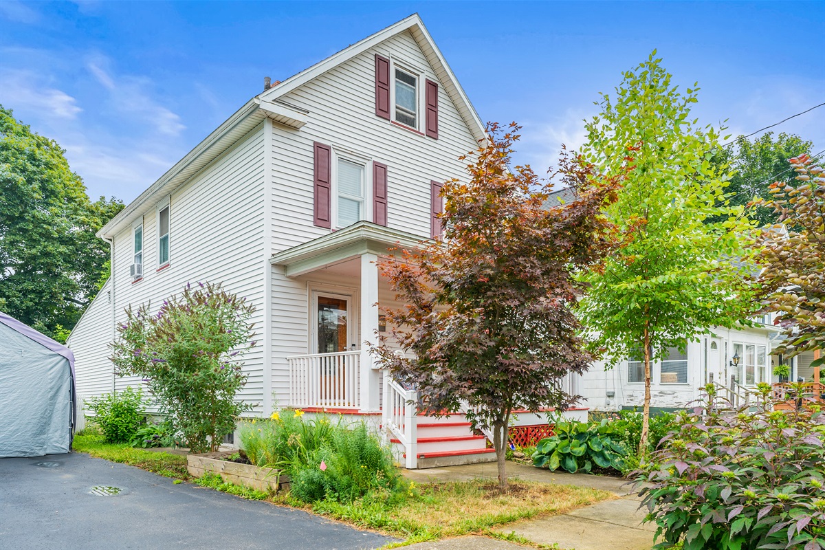 Beautifully updated home and inviting porch welcome you home in this tree-lined neighborhood.