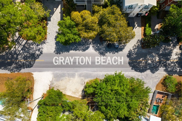 Beach access is just a quick 5-minute drive down the iconic Grayton Beach, through-town path.  Towering pines, magnolias, and scrub oaks twist in the ocean breeze--creating a stunning, windswept canopy as you head south towards the Gulf.