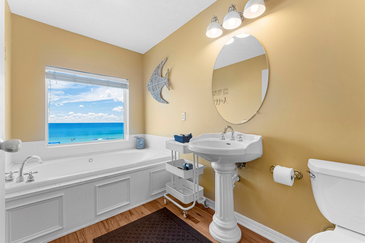 Upstairs master bedroom (2nd floor): King bed + private balcony + ensuite with Jacuzzi tub. Waking up to that view is everything.