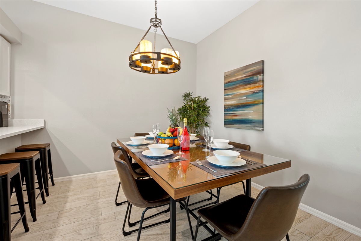 Dining area with plush chairs and stylish place settings for shared meals