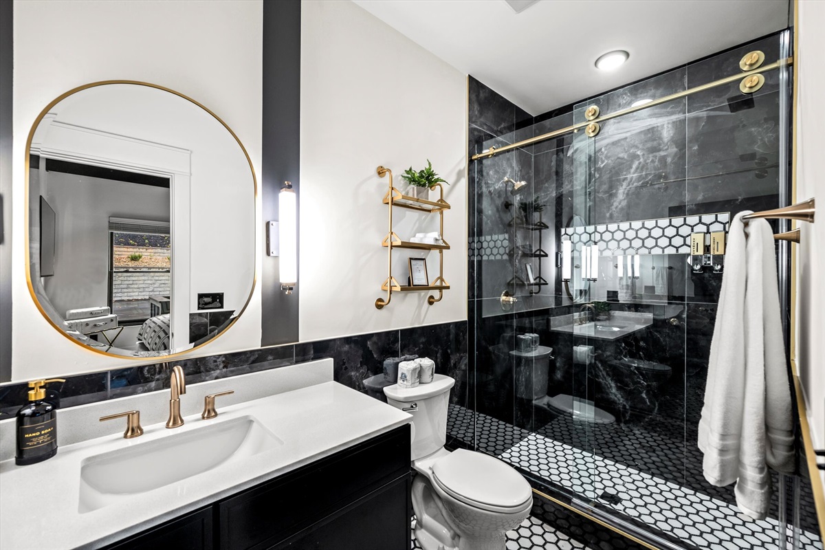 Enjoy the privacy of a contemporary en-suite, featuring a spacious walk-in shower designed for a spa-like start to your day.