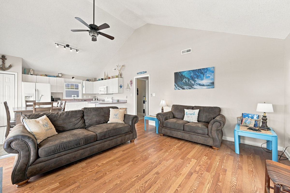 Vaulted ceilings and coastal d&eacute;cor create a bright, welcoming space designed for gathering with family and friends