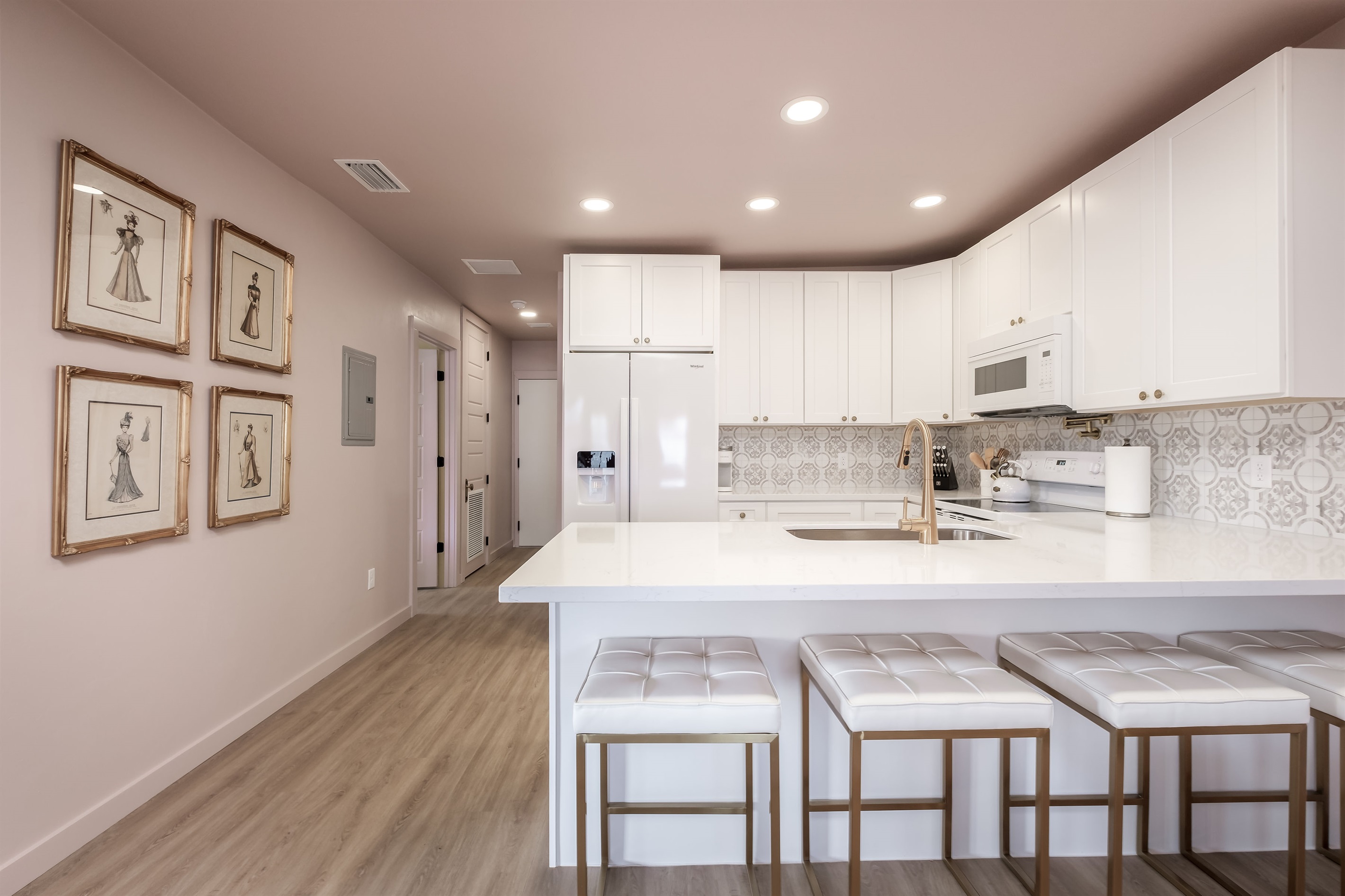 Kitchen and hallway. Hallway door at the ends leads into adjacent "Kate" unit which you can rent separately. 
