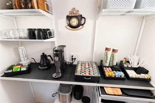 Coffee station with Keurig, complimentary coffee, tea, and supplies