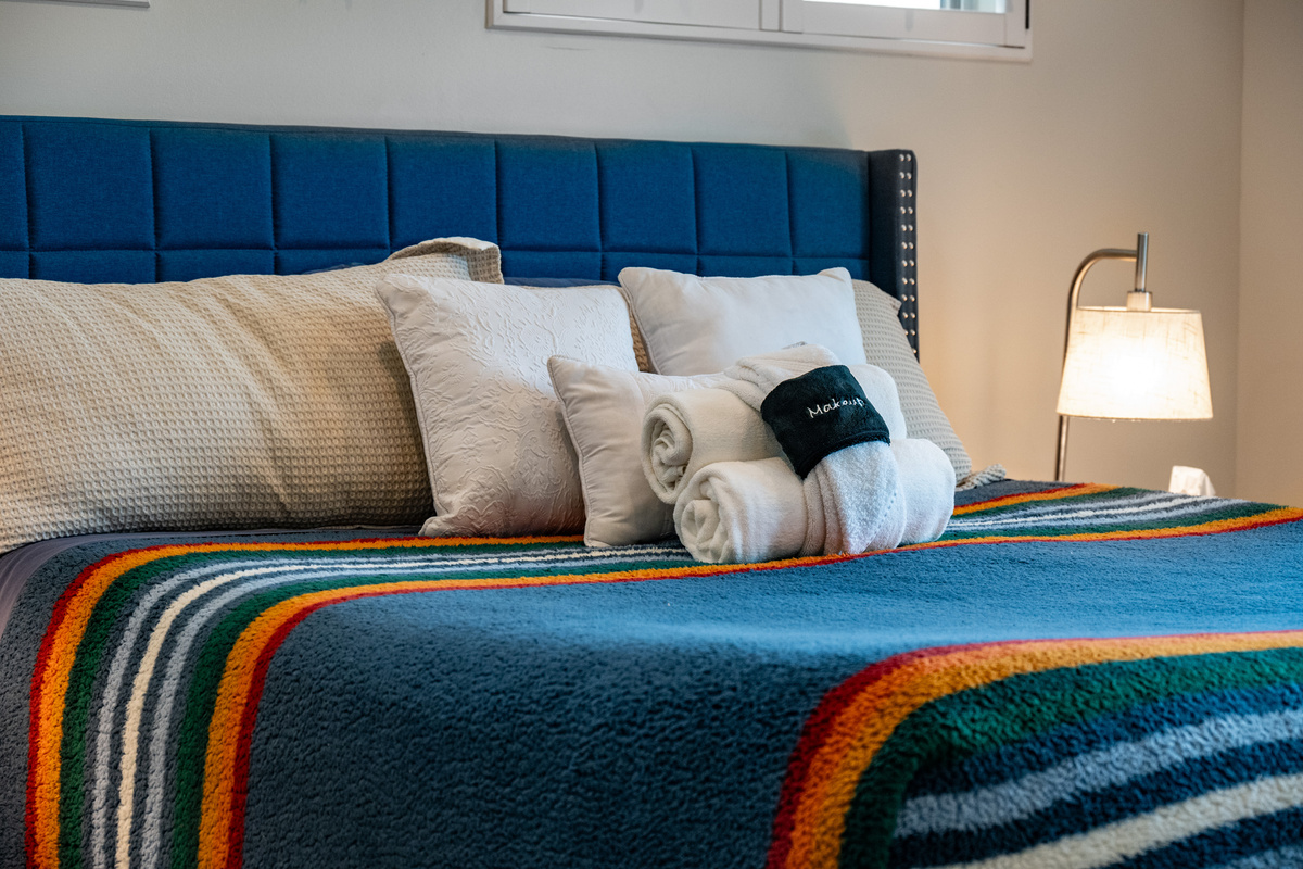 King Bed Comfort – Sink into the comfortable king bed with premium linens and thoughtful touches designed to make your stay feel like home.