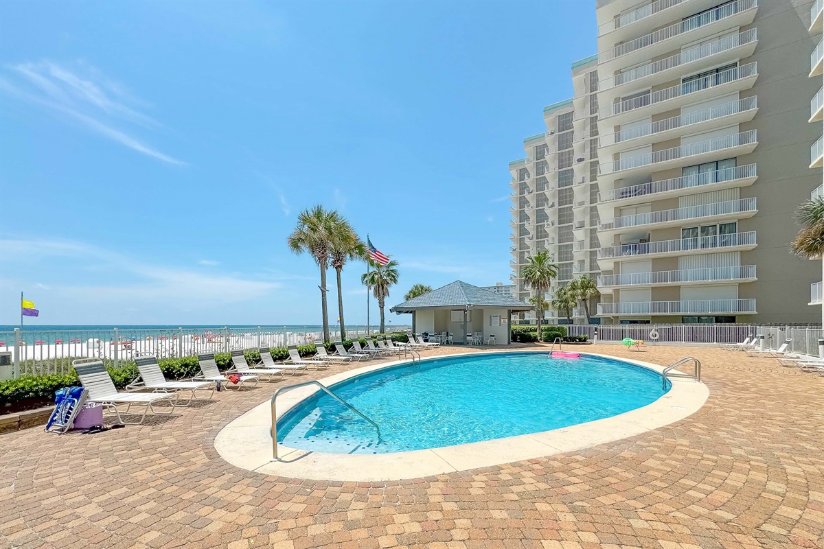 Enjoy effortless entry into our crystal-clear pool, designed for ultimate relaxation at this premier Gulf Shores beachfront property.