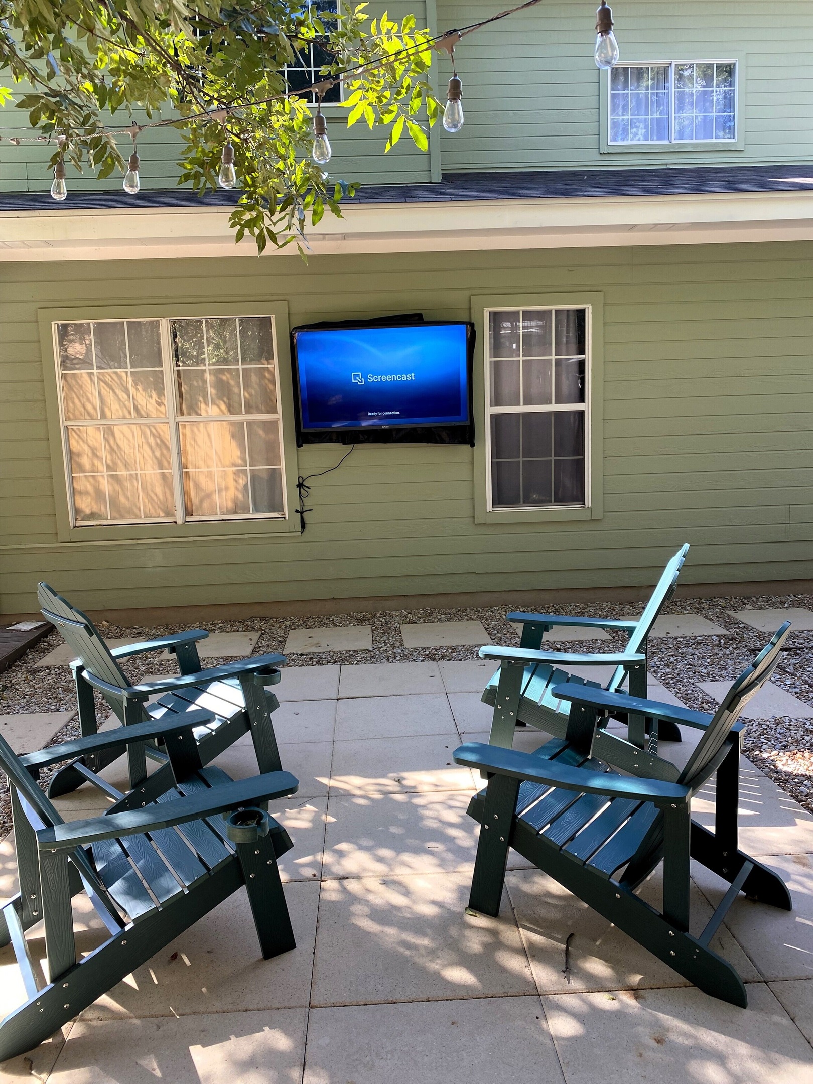 Gather around the versatile fire pit, use as a table or for a cozy fire, with built-in cup holders on the Adirondack chairs for ultimate convenience. Enjoy 'Live from Austin' vibes, a putting green, and a dining area for unforgettable outdoor fun!