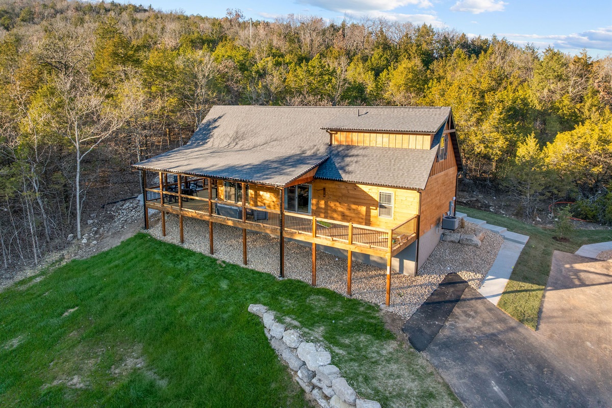 An elevated view highlighting the cabin and its spacious deck.