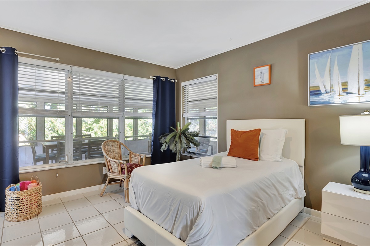One twin bed with personal plant ; )