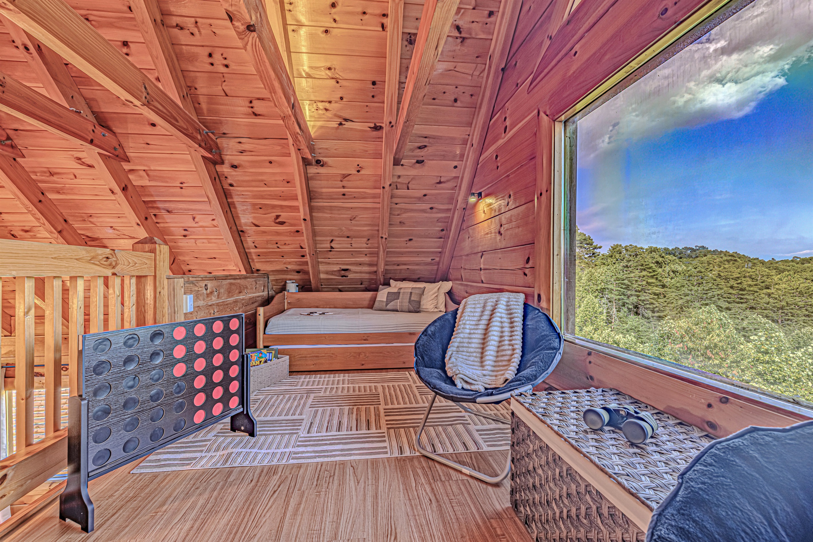 Kids paradise. Mountain views, games galore, and a cozy trundle bed.