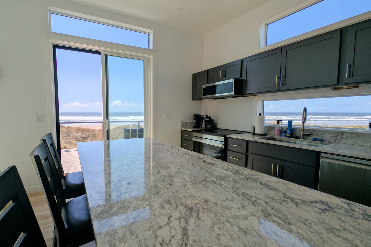 Kitchen with island and seats for 3 with views to the North & West