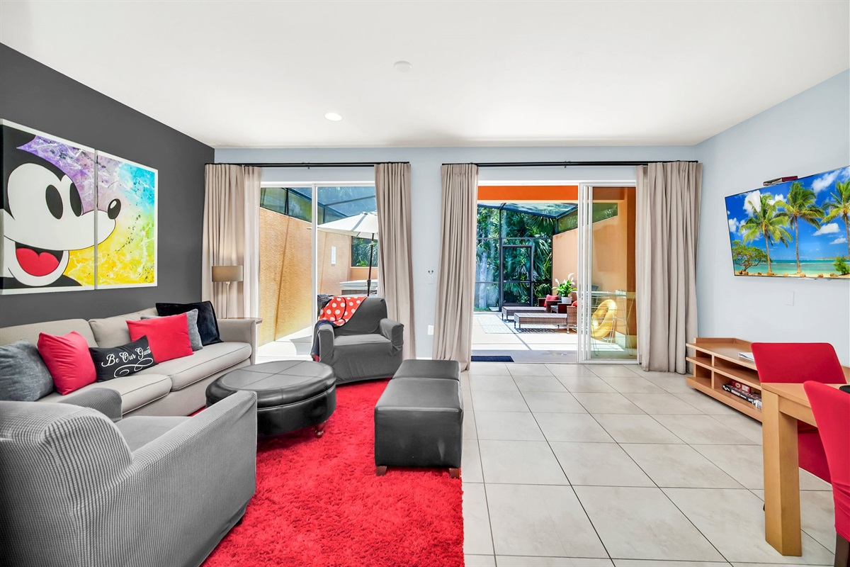 Open concept living, spacious rooms and indoor/outdoor feel with the large glass doors