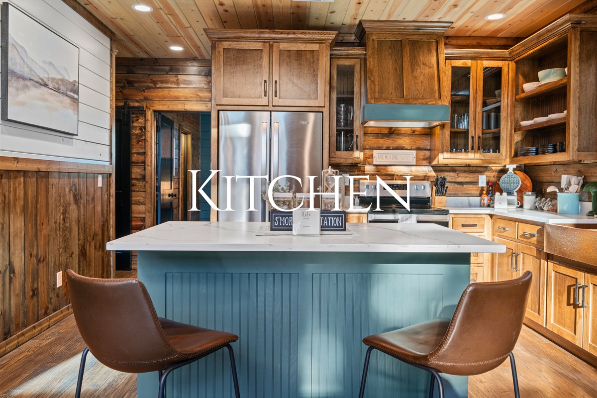 Cooking here is enjoyable thanks to the roomy layout, warm wood finishes, and a kitchen setup that feels both charming and practical.