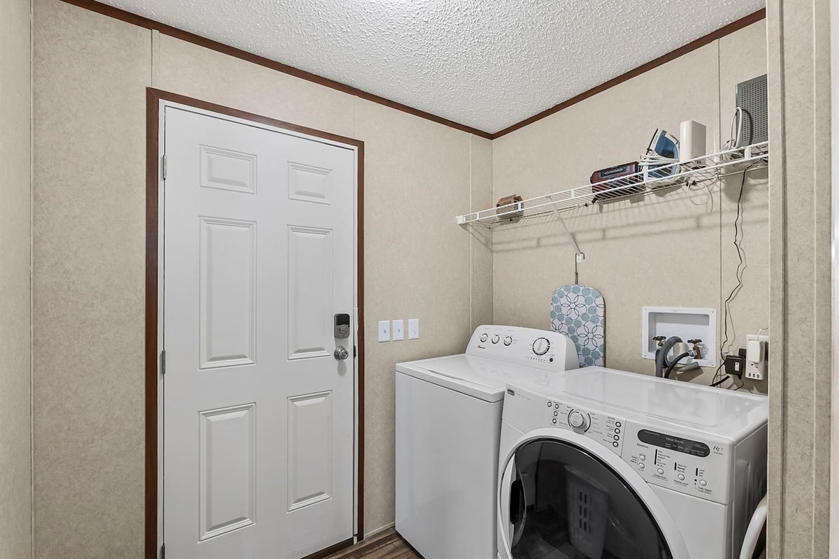 Private laundry space with full-size washer and dryer, making it easy to keep up with your stay essentials.