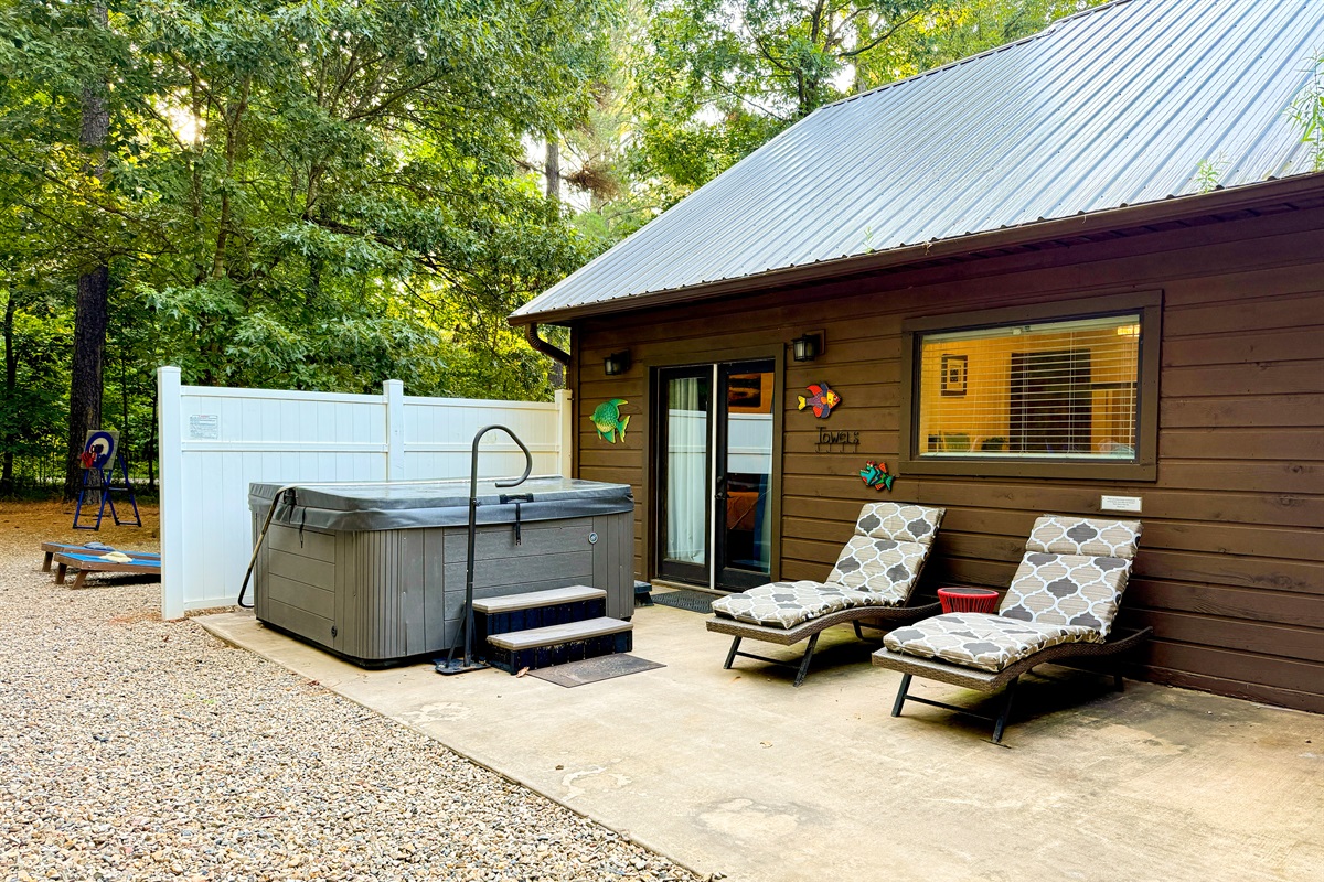 Soak under the stars in your private hot tub or lounge on the deck after exploring Hochatown.