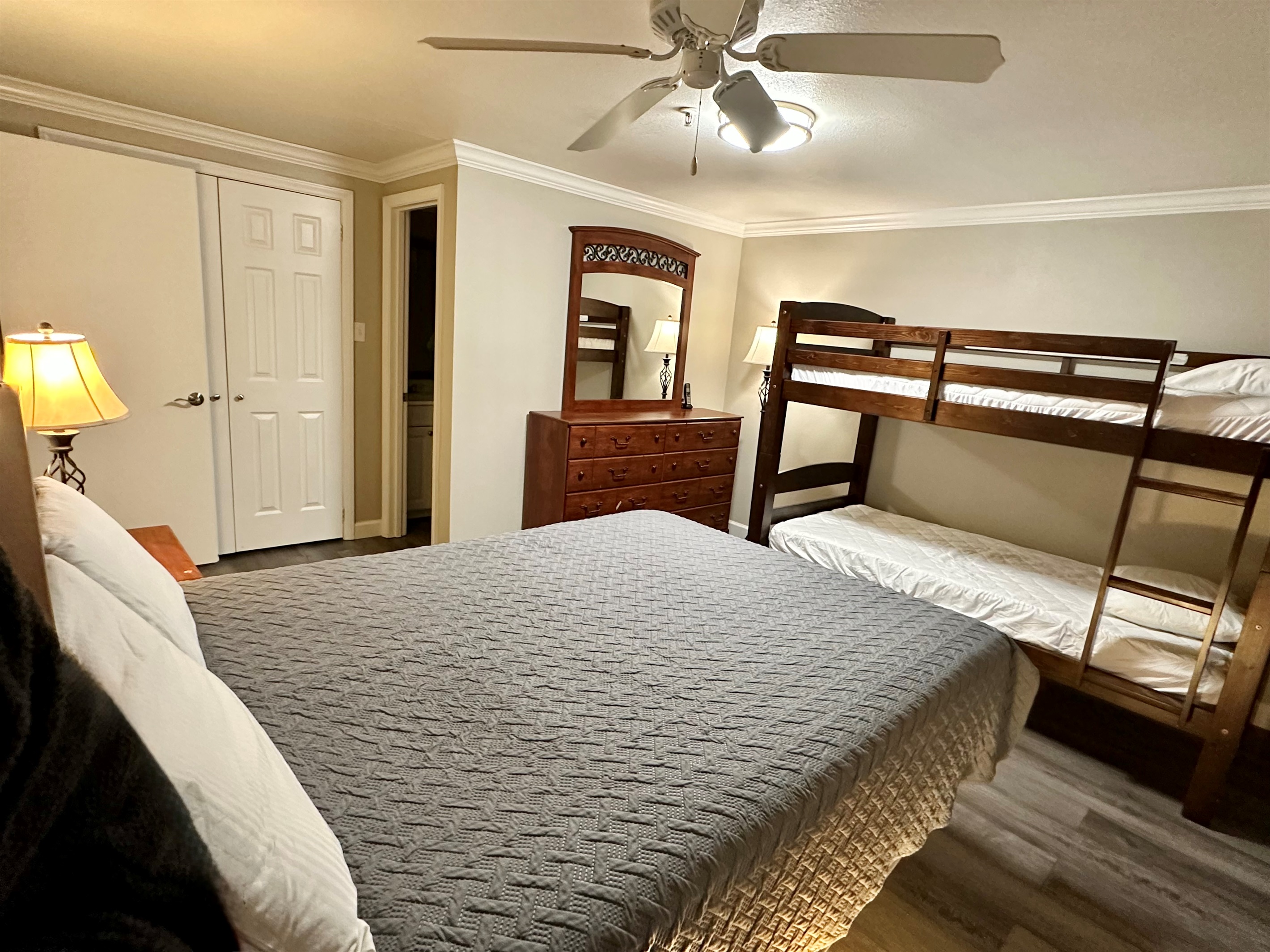 Bunk beds for the kids & a queen bed for the adults in the large second bedroom.