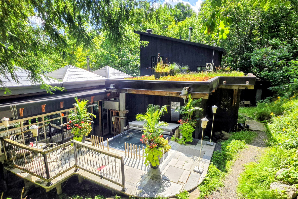 Main cottage from above showing hot tub