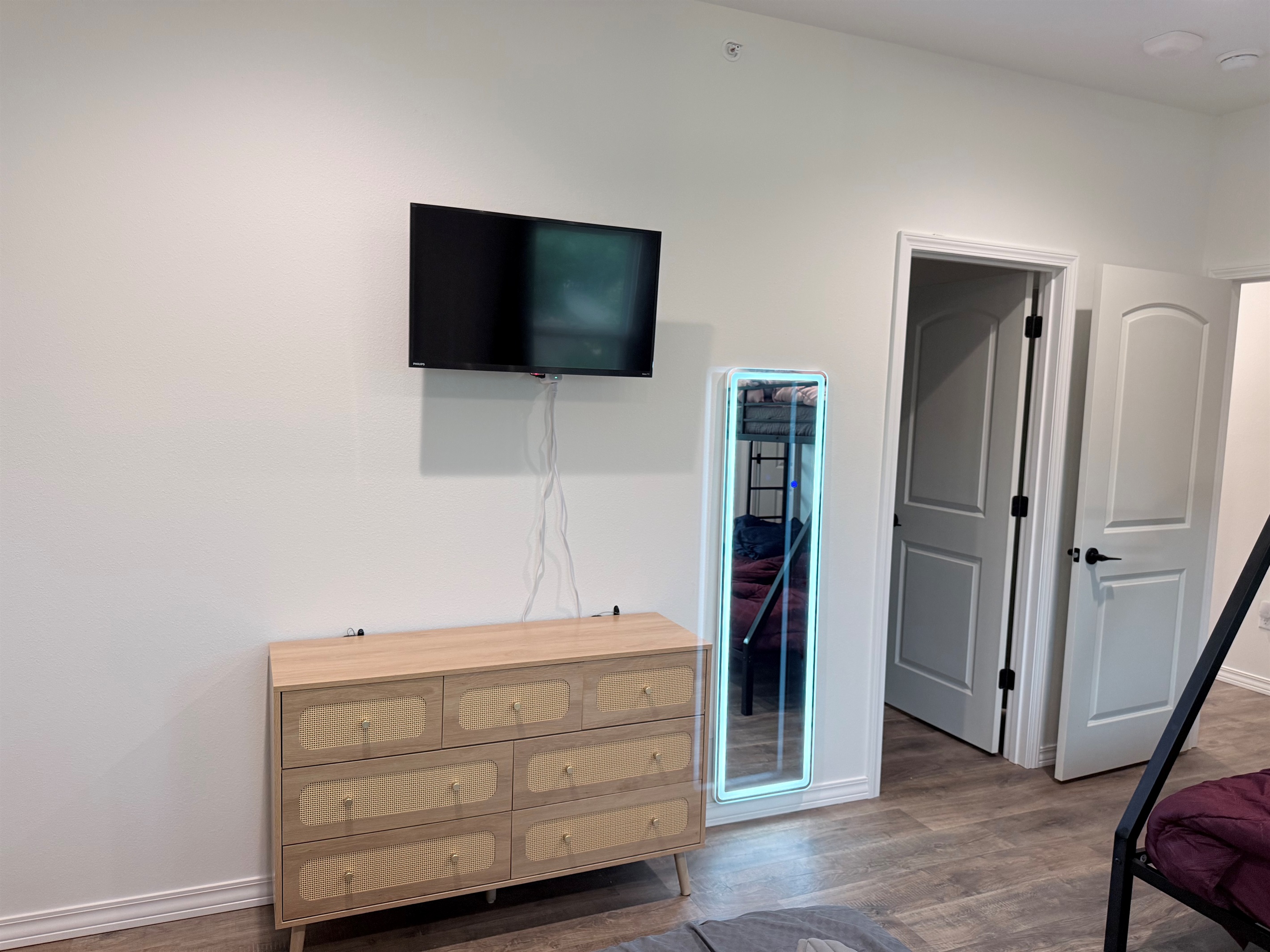 Lots of space to move around, Lighting in mirror makes getting ready easy if bathroom is in use.