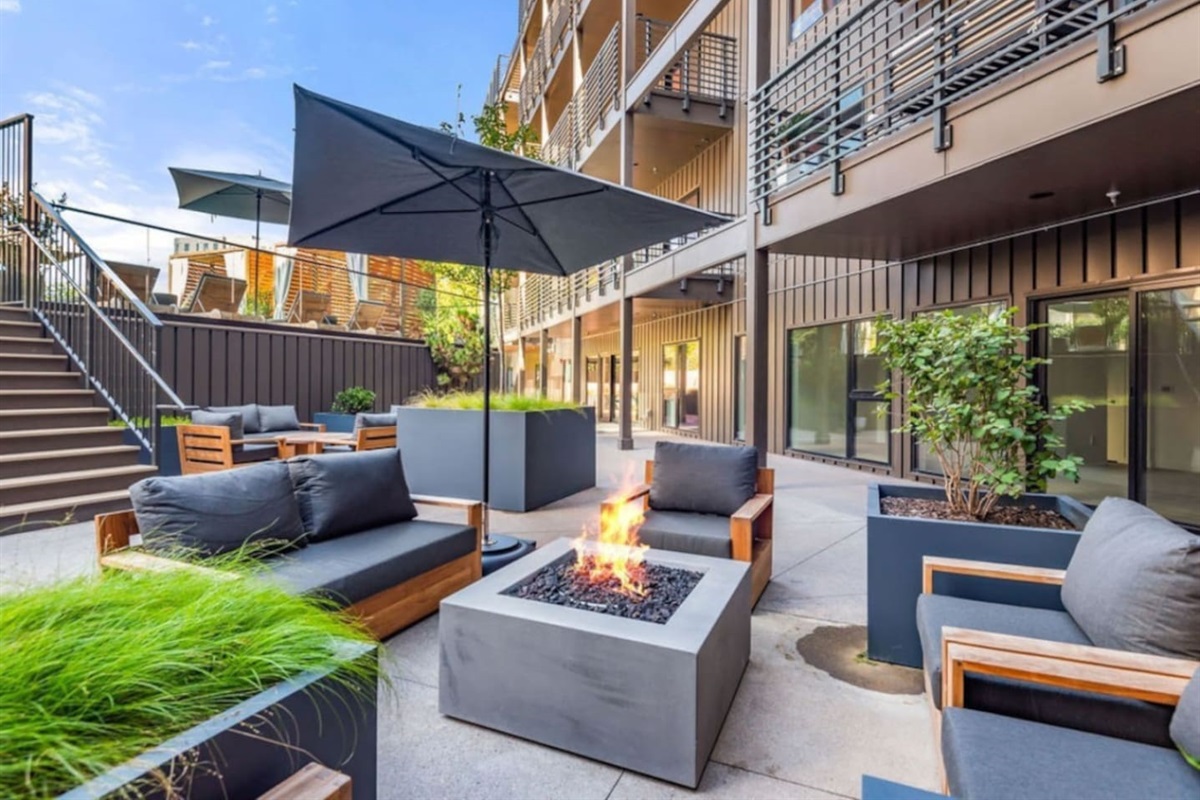 Fire Pit!! Lower pool deck patio area - tons of seating - public area in the building and guests are encouraged to use during their stay with us!