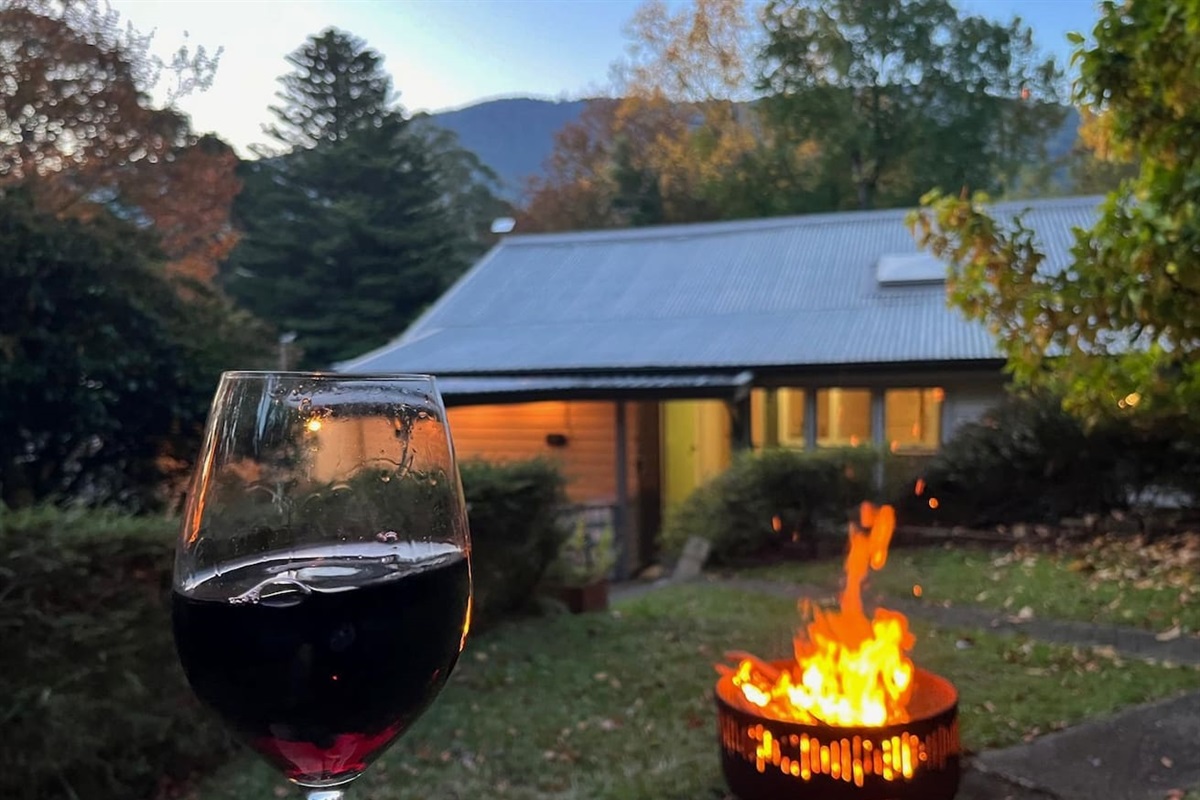 The fully fenced yard is immense. There is a garden in the front, facing Donna Buang, which you can also see from this pic  - this is the fire pit area in the back. Further in the very back is a large yard and lawns. There is also a covered deck/BBQ.