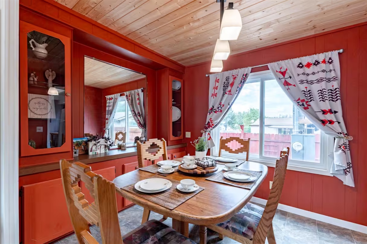 Enjoy meals, movies, and fire-lit evenings in this charming space.—complete with a Smart TV, DVD player, and an electric fireplace for cozy evenings.