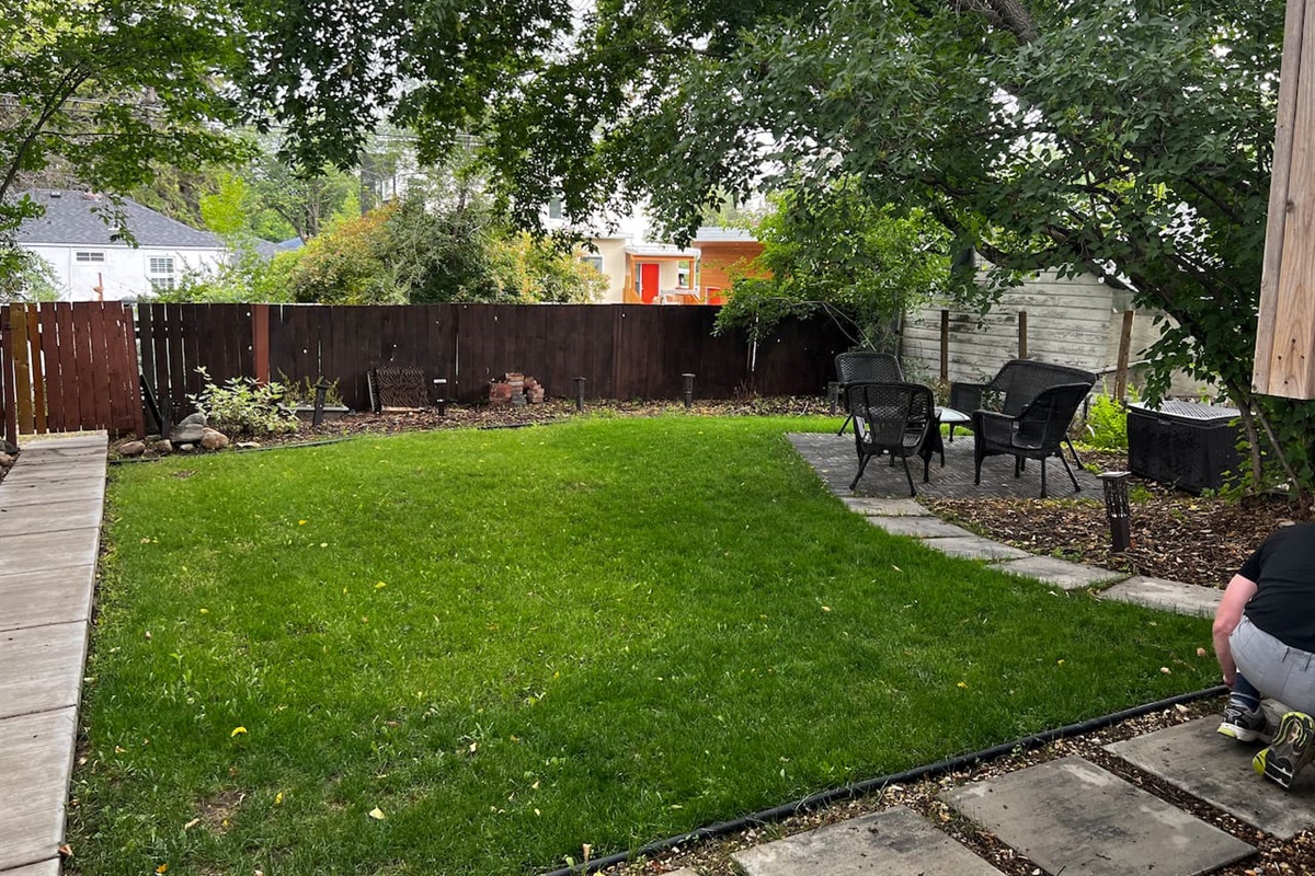 Fenced backyard space. Shared with the main floor suite guest. 