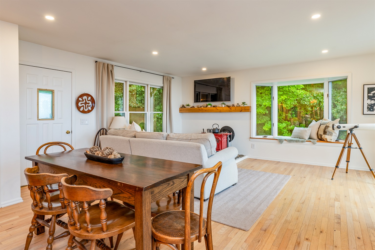 Cozy dining meets functional design in this open-concept common area.