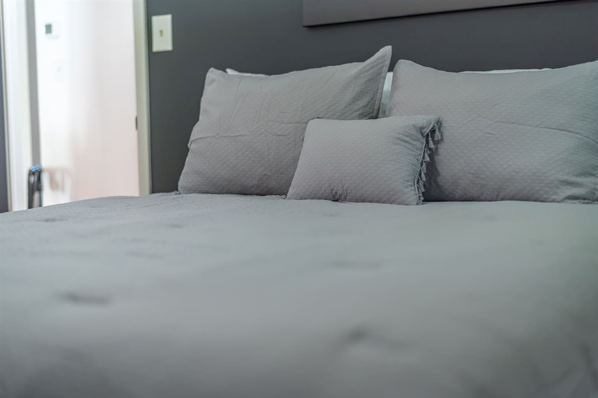 2 Queen size w 6 pillows each bed for R&R each bedroom has a luggage rack.