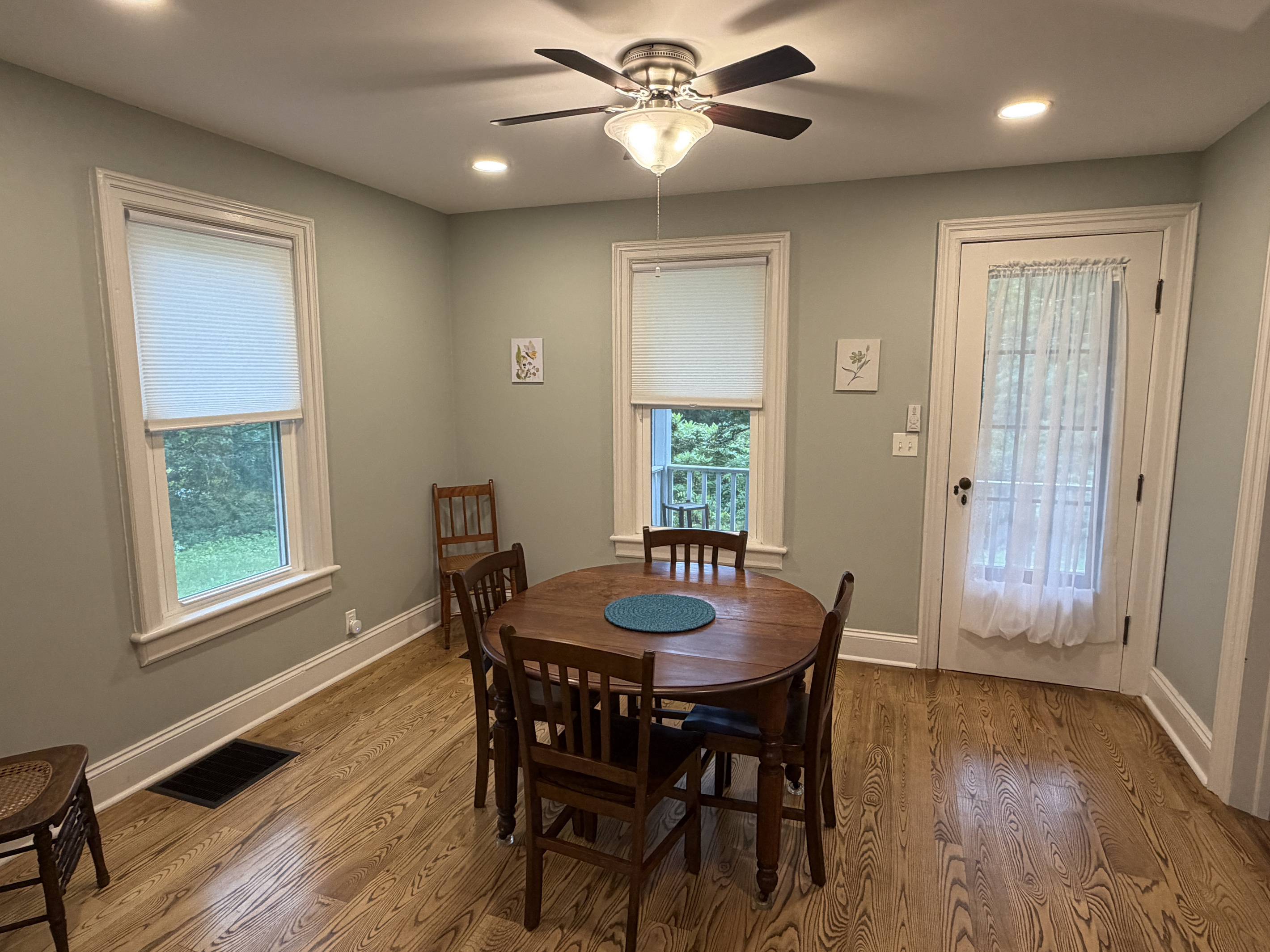 Dining area with door to covered front porch