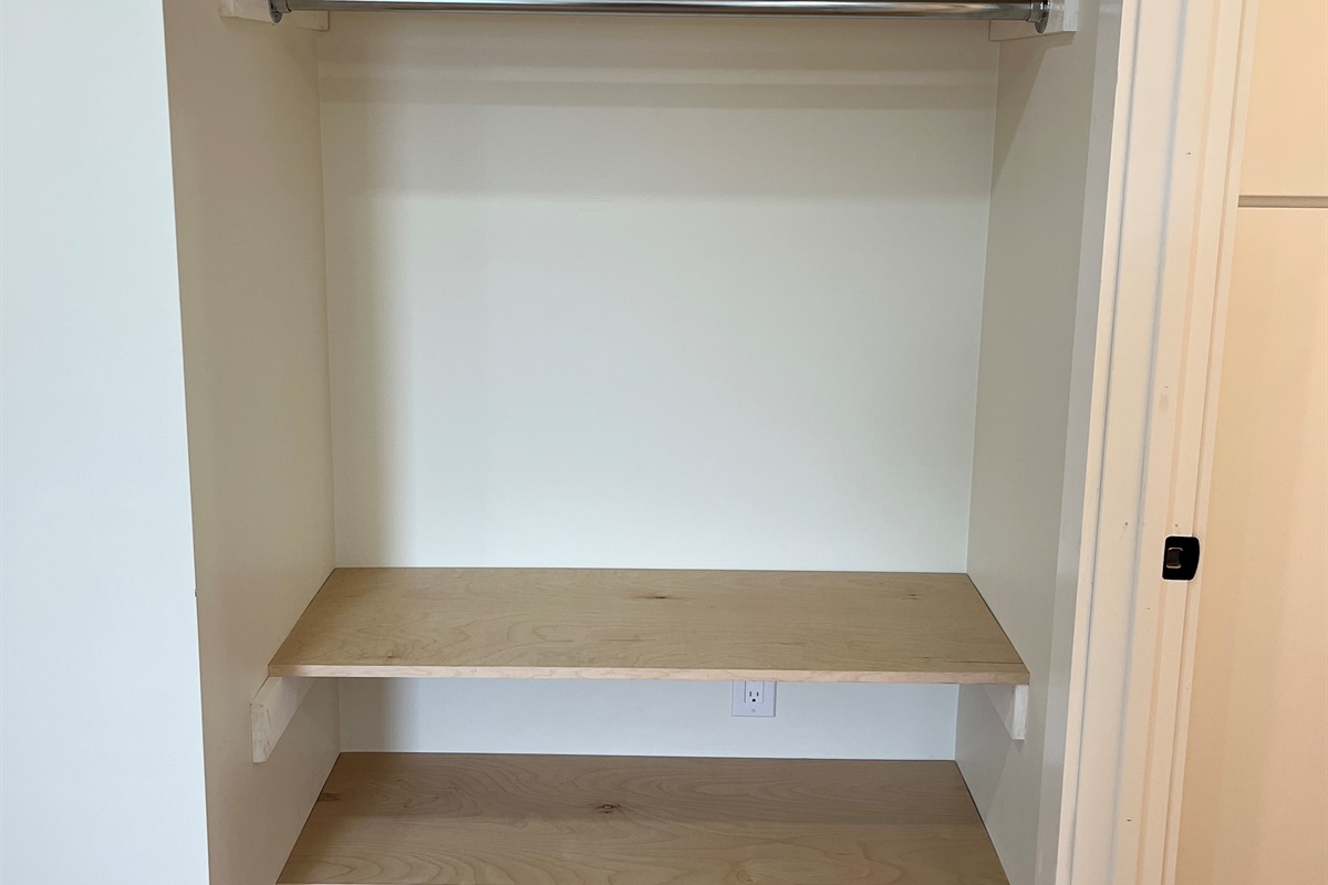 Storage outside bathroom