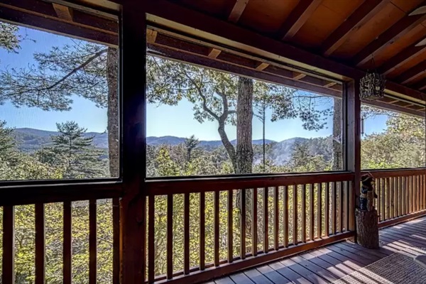 Screened-in patio located just outside the living room.