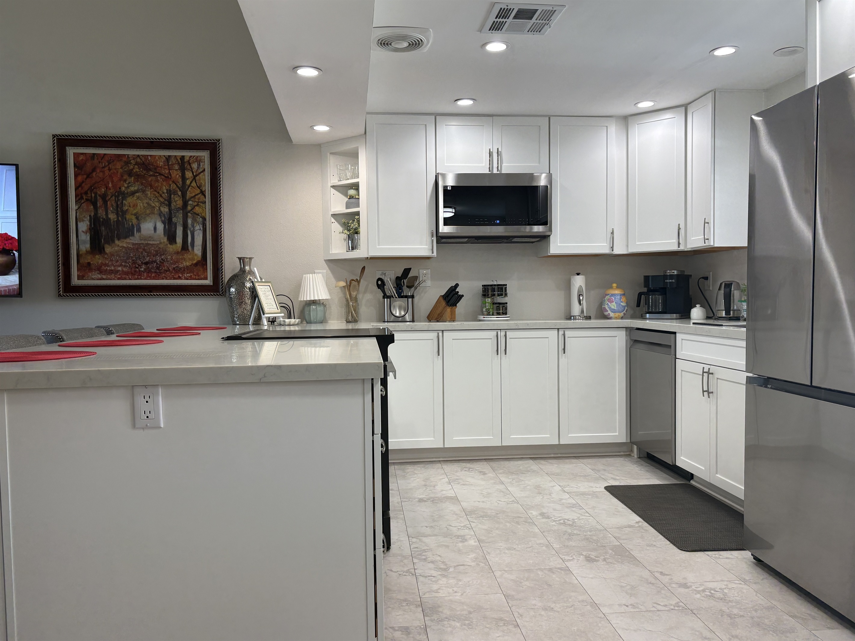 The brand new large kitchen is fully equipped for home cooking  & all your entertaining needs with a BBQ on the patio.
