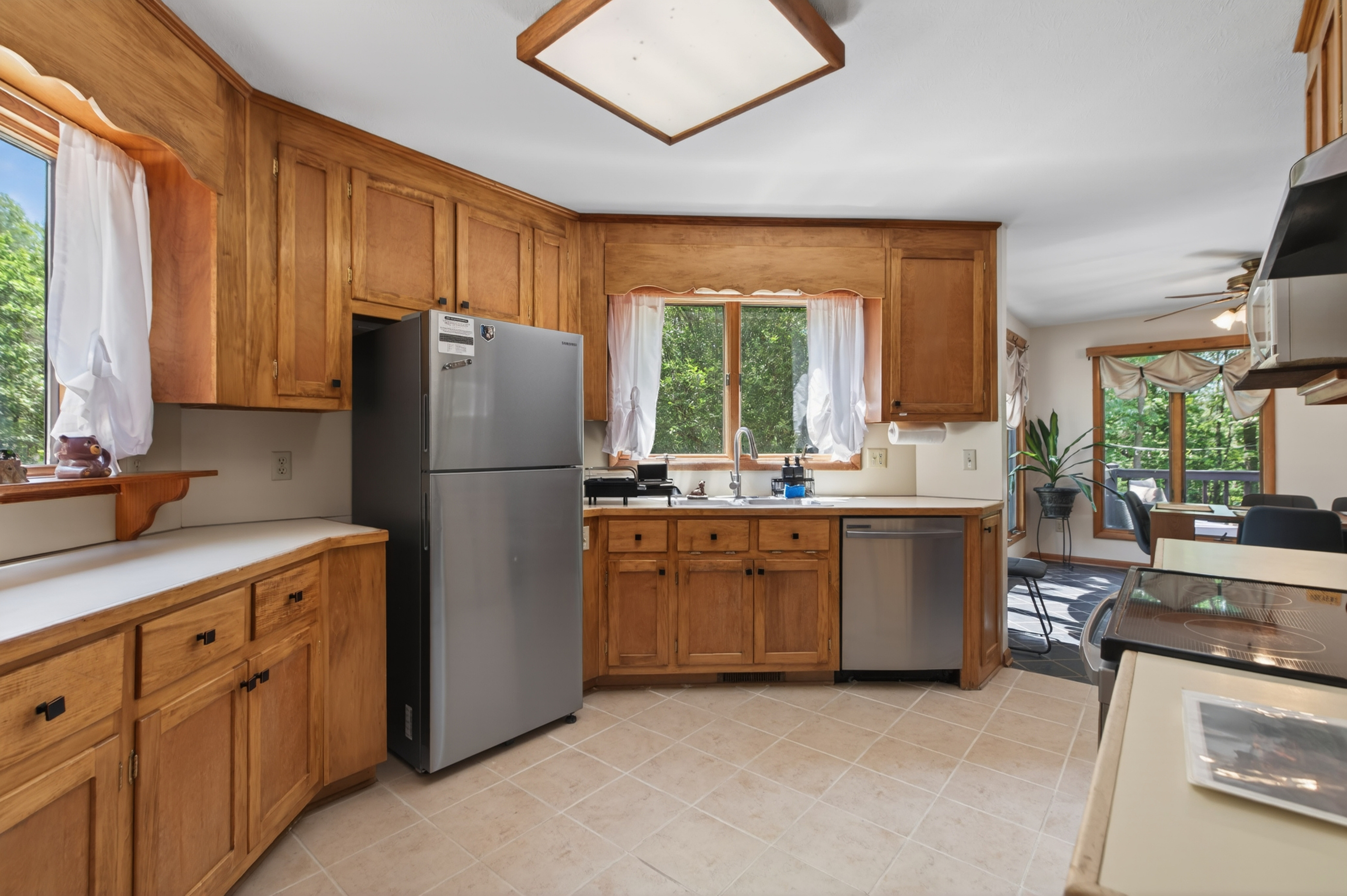 Kitchen Delight: Bright and airy culinary space with modern appliances and serene nature views!