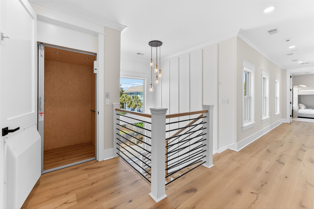 Elevator on 2nd Floor Landing | On Beach Time | 6 30th Ave, Isle of Palms, SC | IOP Escapes