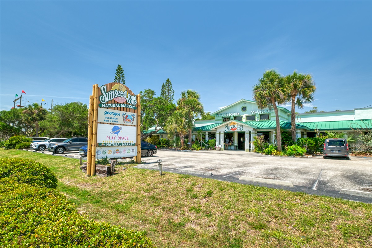 Directly across A1A (less than the equivalent of a block) is Sunseed Co-Op Natural Food grocery store, Play Space Indoor Playground and Casual Dining.