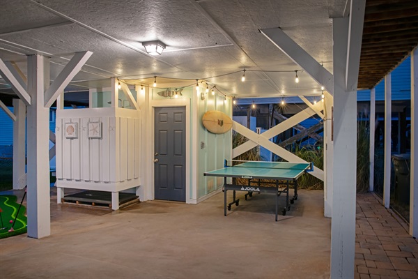 Outdoor shower or ping pong under the lights!