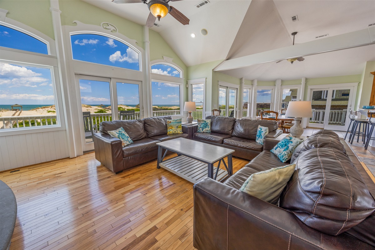 A cozy sitting area with a beach view.