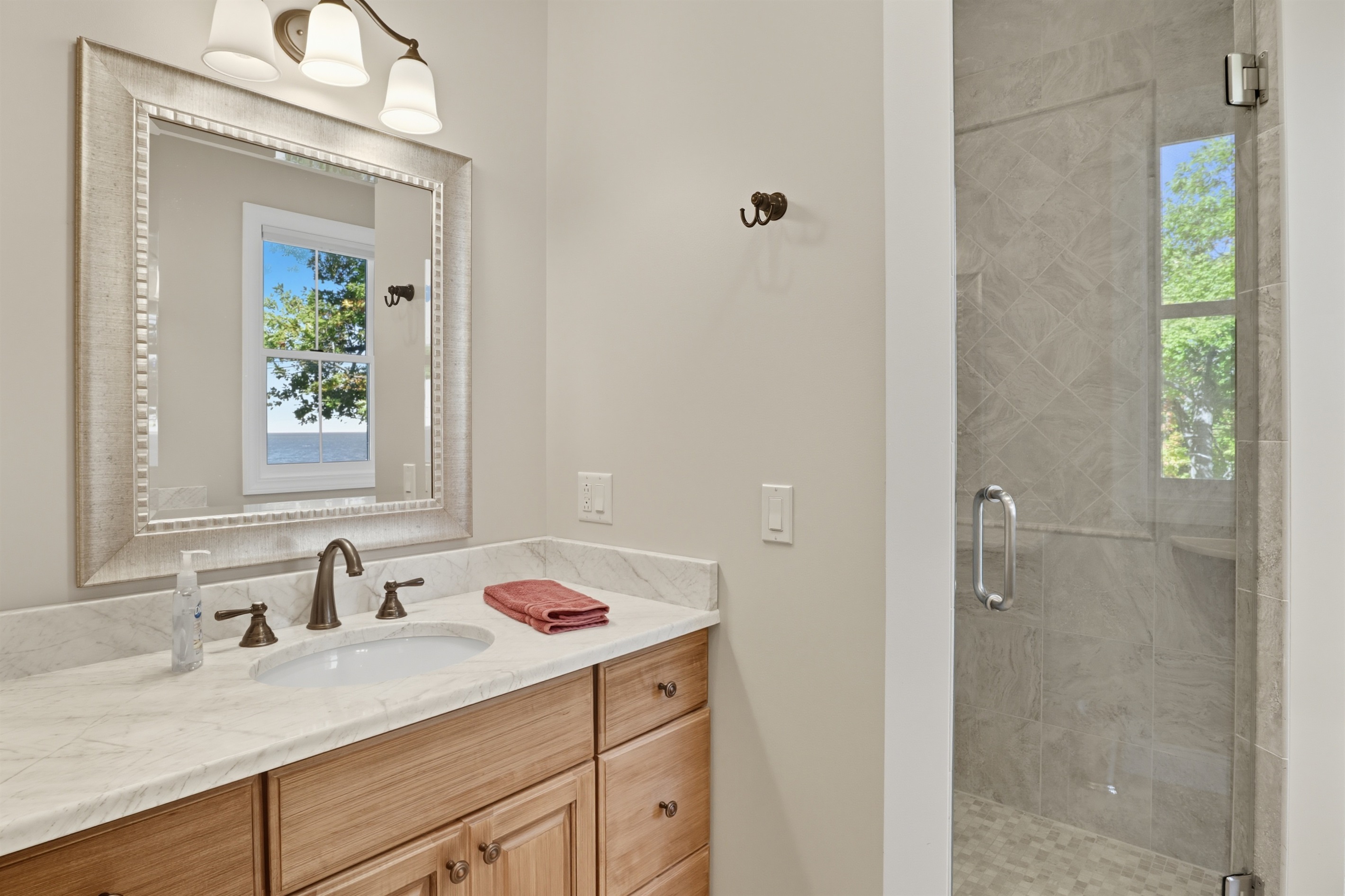 Modern master bathroom with double sinks and walk in shower. Bathroom #1