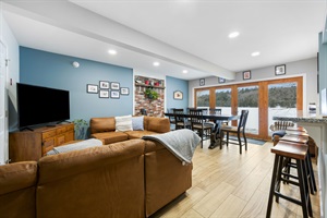 Living room with couches and a tv