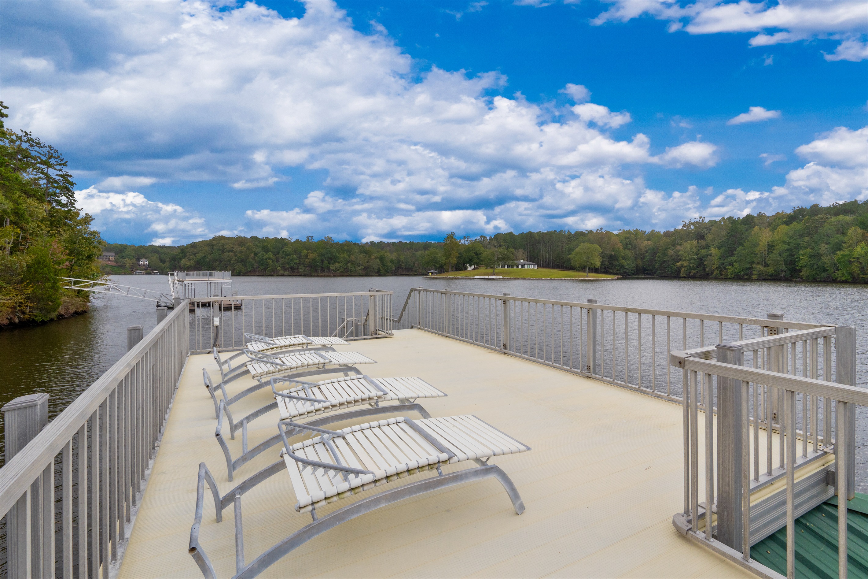Enjoy the floating dock with a spacious sundeck, perfect for lounging in the sun, swimming, or tying up your boat for a day on the water.
