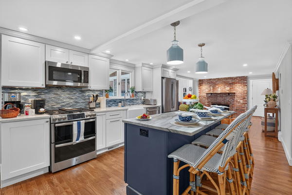 Gather around the dining table for memorable meals just steps from the kitchen.