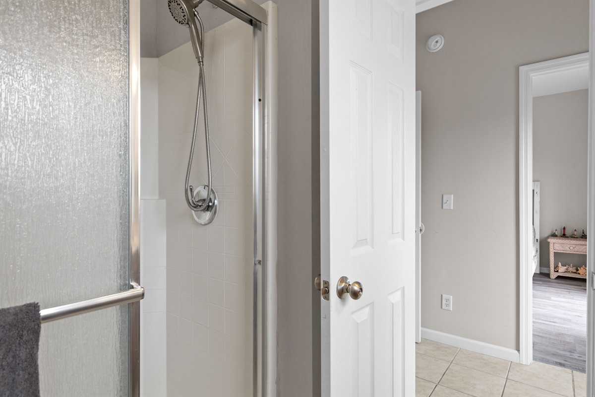 Walk-in shower with easy access from the bedroom
